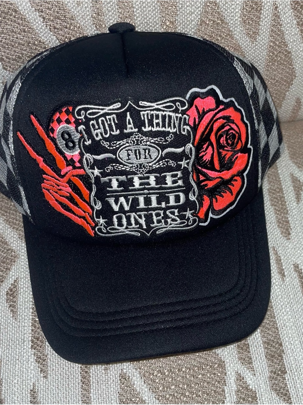 Black Graphic Trucker Hat with Red Rose & Skeleton Hand
